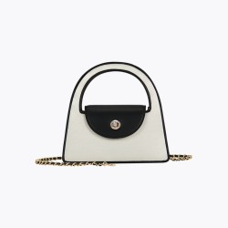 Compact handbag in black and white contrasting fashion