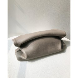A chic rolled-edge leather clutch